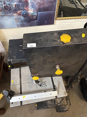 Lot 900 - An electric band saw with stand