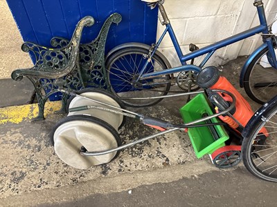 Lot 920 - A backpack garden sprayer, a rolling water...