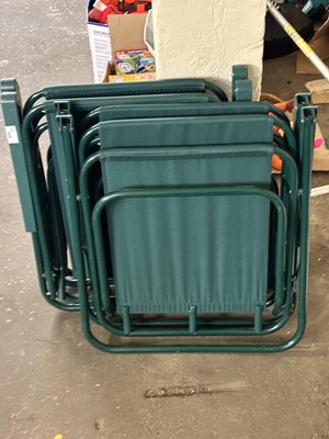 Lot 935 - A set of four folding garden chairs