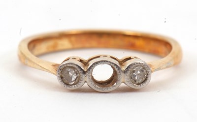 Lot 56 - A diamond ring, (centre stone missing), with...