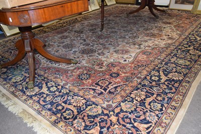 Lot 497 - A large Belgian Prado wool floor rug in the...