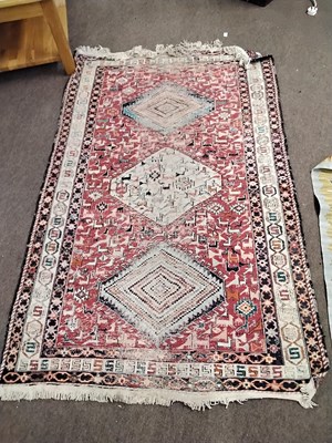 Lot 575 - A 20th Century Afghan Kilim rug decorated with...