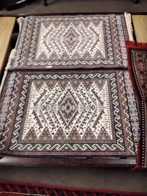 Lot 577 - A pair of 20th Century machine made Middle...