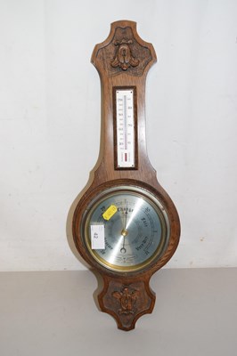 Lot 42 - A modern oak barometer by Comitti of London