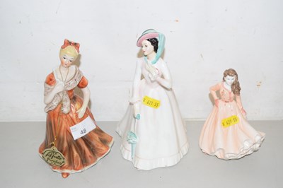 Lot 48 - A Royal Doulton figure Julia together with two...