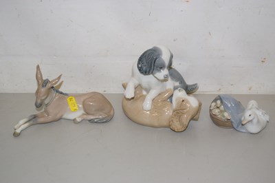 Lot 73 - A Lladro donkey, Lladro ducks and Nao puppy...
