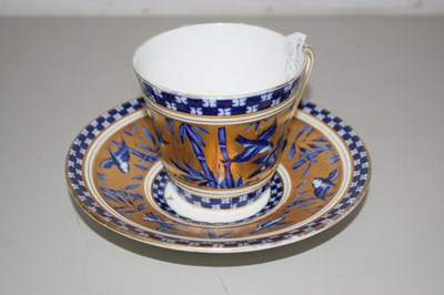 Lot 83 - A Coalport gilt decorated cup and saucer