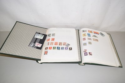 Lot 99 - Two albums of principally 20th Century world...