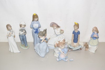 Lot 134 - A group of eight various Nao and Lladro figures