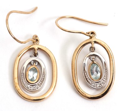 Lot 83 - A pair of 9ct topaz and diamond highlight...