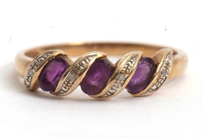 Lot 63 - A 9ct amethyst and diamond highlight ring,...