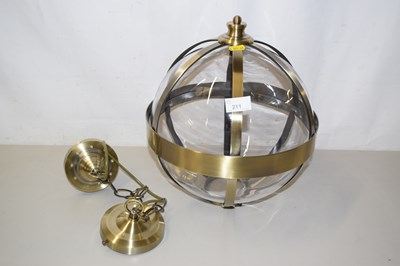 Lot 211 - A modern metal and glass globe formed light...