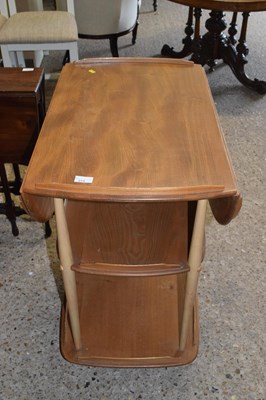 Lot 273 - An Ercol drop leaf elm tea trolley