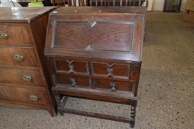 Lot 297 - An early 20th Century oak bureau