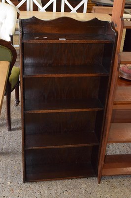 Lot 306 - A 20th Century open front bookcase