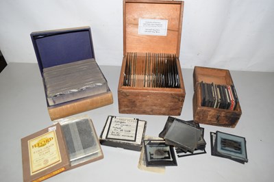 Lot 513 - A box of assorted glass slides and others,...