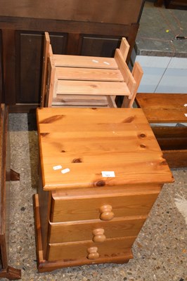Lot 321 - A pine bedside cabinet and a pine shoe rack