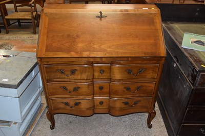 Lot 331 - A reproduction serpentine front bureau