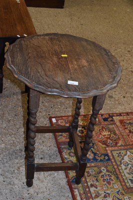 Lot 334 - An early 20th Century oak table on barley...