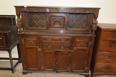 Lot 340 - A 20th Century oak court cupboard