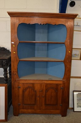 Lot 252 - A stained pine corner cabinet