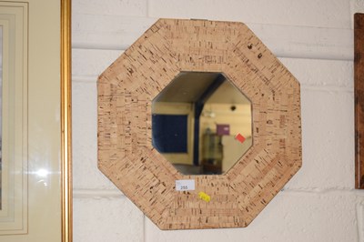 Lot 255 - An octagonal cork framed mirror
