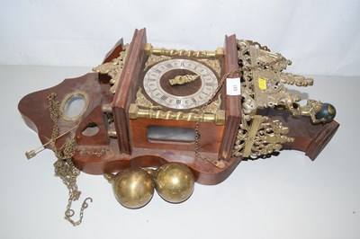 Lot 641 - A brass mounted wooden wall clock