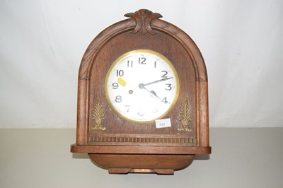 Lot 642 - Wooden cased wall clock