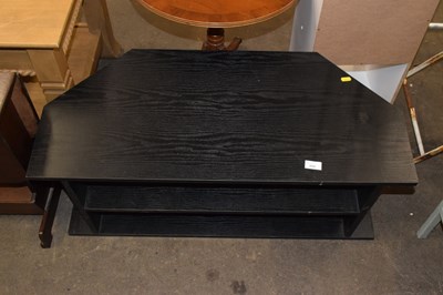 Lot 808 - A dark finish TV stand