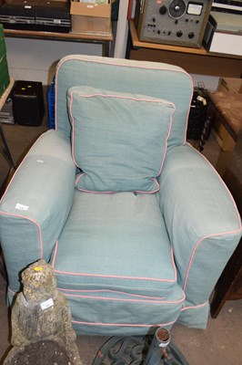 Lot 779 - A green and pink upholstered armchair