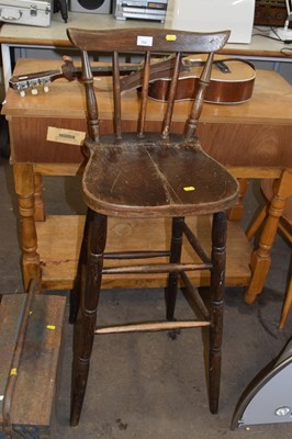 Lot 784 - A pine bar stool