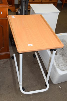 Lot 790 - An overbed trolley