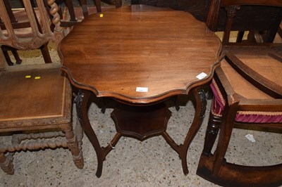 Lot 268 - A two tier centre table