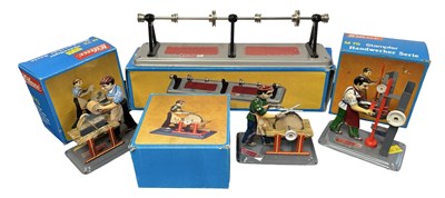 Lot 196 - Four boxed Wilesco tinplate toys, to include:...