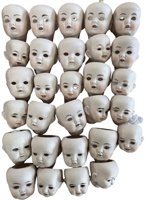Lot 269 - A quantity of various bisque dolls heads,...