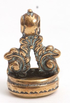 Lot 130 - An unmarked yellow metal fob, with collet...