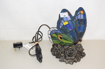 Lot 29 - A reproduction Tiffany style butterfly lamp