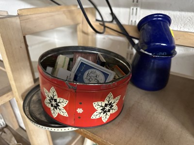 Lot 72 - Two small blue enamel jugs together with a tin...