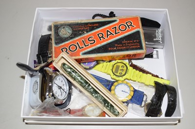 Lot 99 - A box of various wristwatches, razor etc