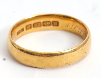 Lot 202 - A 22ct wedding band, 4.5mm wide, hallmarked...