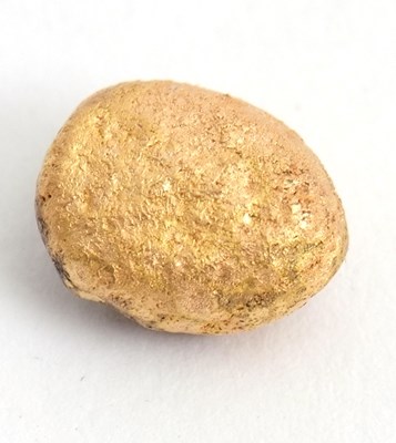 Lot 211 - An unmarked yellow metal nugget, assessed as...
