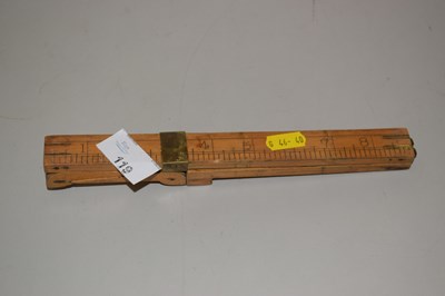 Lot 119 - A folding wooden ruler