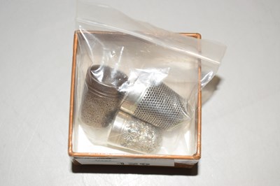 Lot 120 - A group of three thimbles