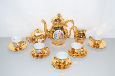 Lot 180 - An Epaig gold lustre tea set