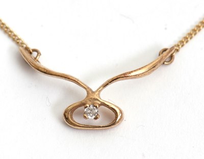 Lot 81 - A 9ct diamond necklace, the fixed pendant set...