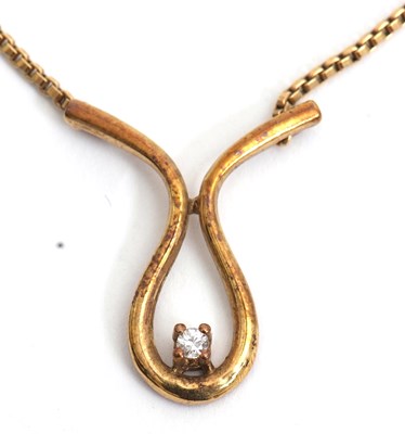 Lot 82 - A 9ct diamond necklace, the fixed loop set...