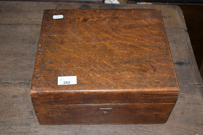 Lot 282 - A late 19th Century oak writing box