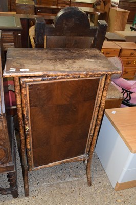 Lot 304 - A Victorian bamboo framed single door cupboard