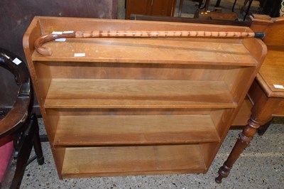 Lot 313 - A light oak bookcase cabinet