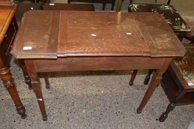 Lot 316 - 20th Century metamorphic writing table